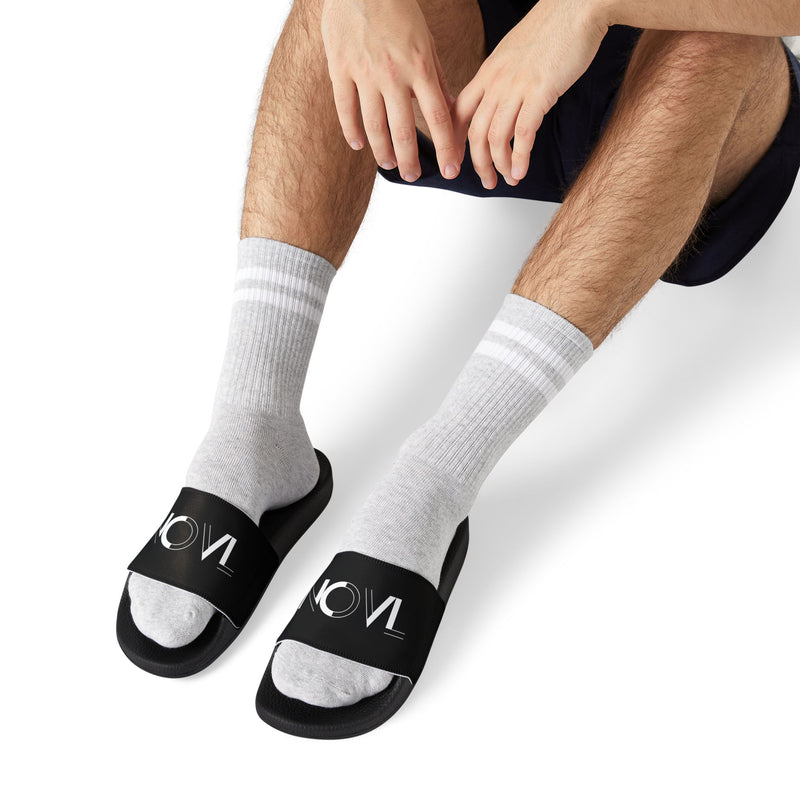 NOVL Unisex Sandals: Black/Black | White